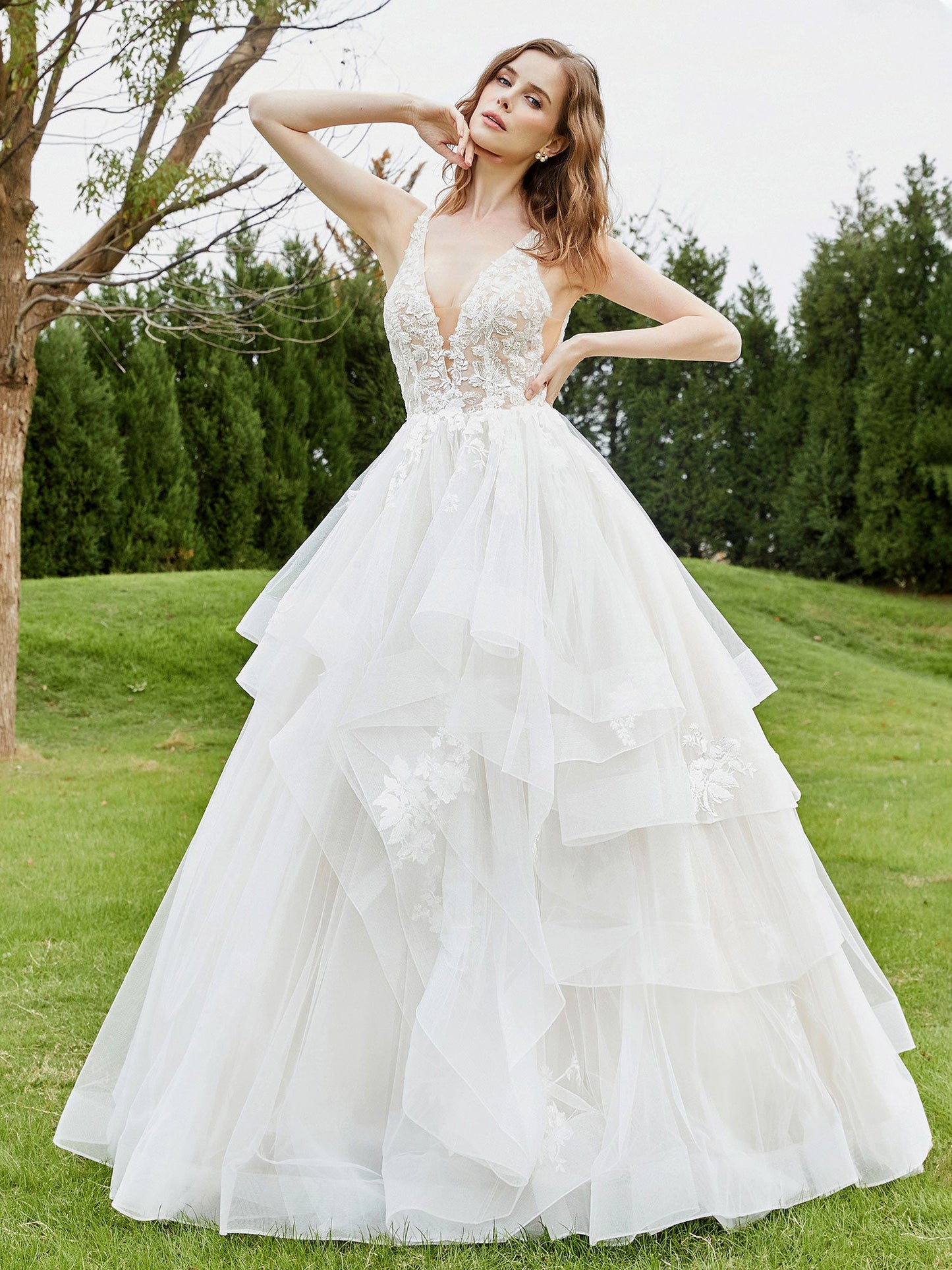 Vestido de Novia Sin Mangas con Escote en V Profundo y Corsé de Encaje Color Marfil