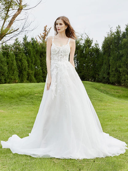 Vestido de Novia de Tul Marfil con Tirantes Espagueti y Cola de Capilla