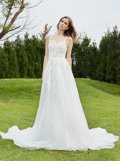 Vestido de Novia de Tul Marfil con Tirantes Espagueti y Cola de Capilla