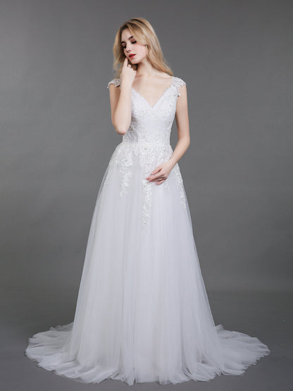 Dos Vestidos de Novia de Tul con Espalda Abierta en Color Marfil