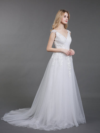 Dos Vestidos de Novia de Tul con Espalda Abierta en Color Marfil