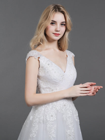 Dos Vestidos de Novia de Tul con Espalda Abierta en Color Marfil