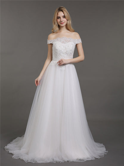 Vestido de Novia Marfil con Encaje y Tul de Corte Asimétrico