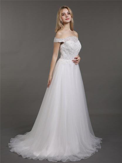 Vestido de Novia Marfil con Encaje y Tul de Corte Asimétrico