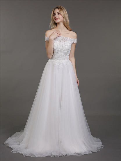 Vestido de Novia Marfil con Encaje y Tul de Corte Asimétrico