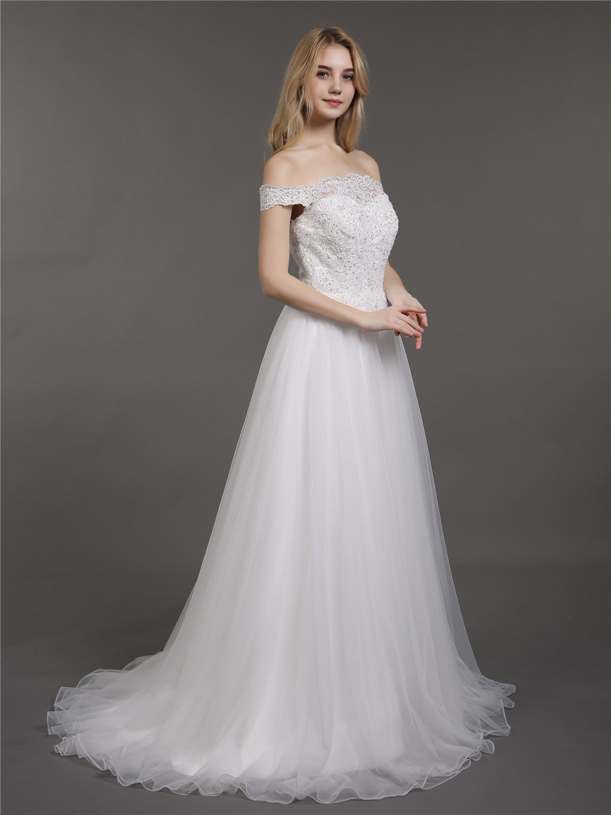 Vestido de Novia Marfil con Encaje y Tul de Corte Asimétrico