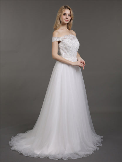 Vestido de Novia Marfil con Encaje y Tul de Corte Asimétrico