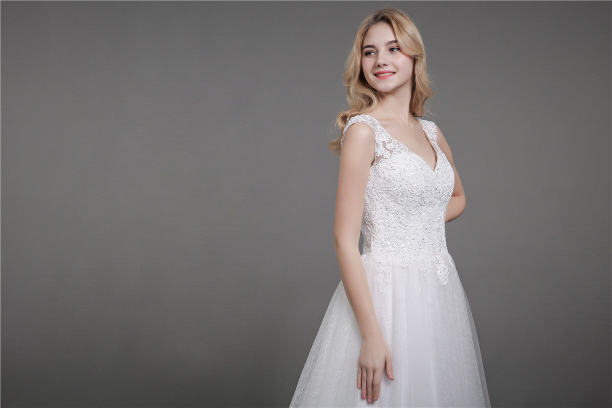 Vestido de Novia Marfil con Tirantes de Encaje y Cola Larga