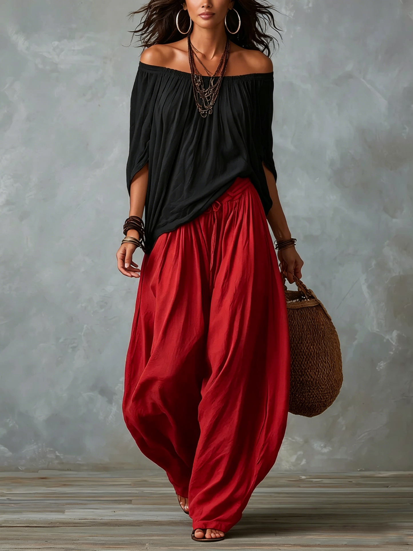 Blusa blanca con hombros descubiertos y pantalones de corte ancho estilo linterna