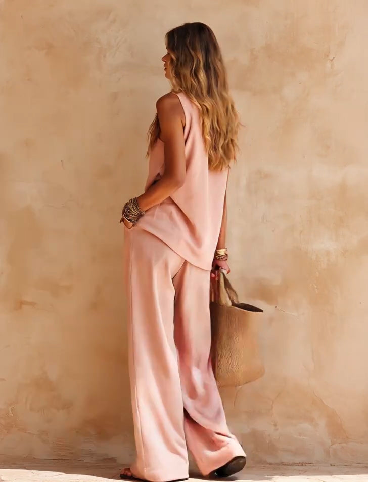 Conjunto casual rosa: top asimétrico sin mangas y pantalón