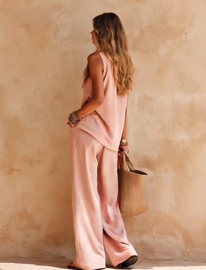 Conjunto casual rosa: top asimétrico sin mangas y pantalón