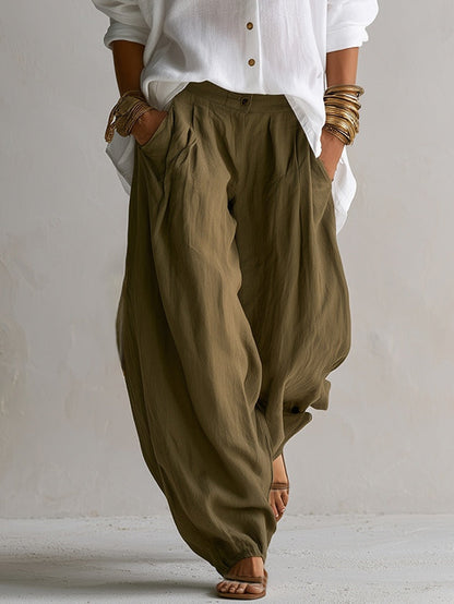 Camisa blanca holgada y pantalón verde de pierna ancha estilo lantern